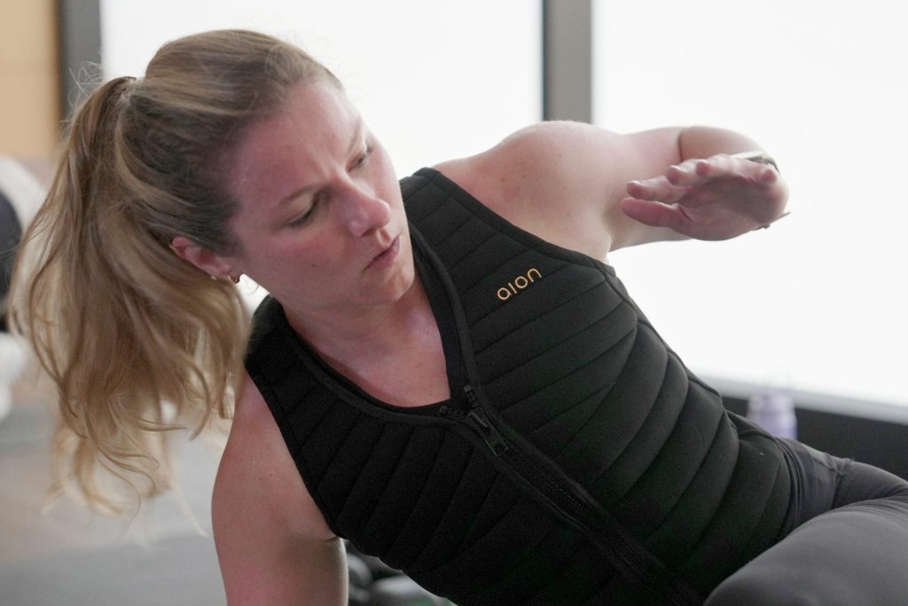 Nora Capocci wears a weighted vest during an MB360 workout class at the Life Time health club in New York last August.